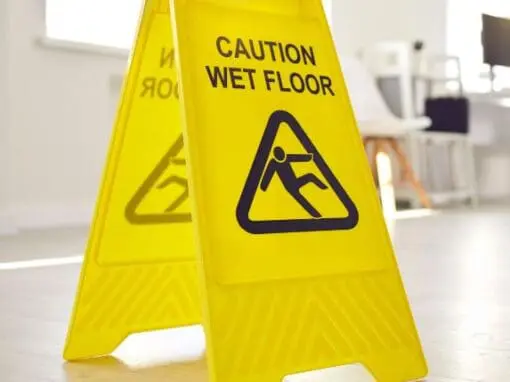 Caution wet floor health and safety sign