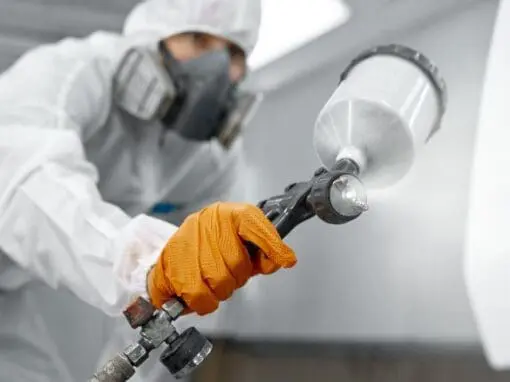 Man spraying car