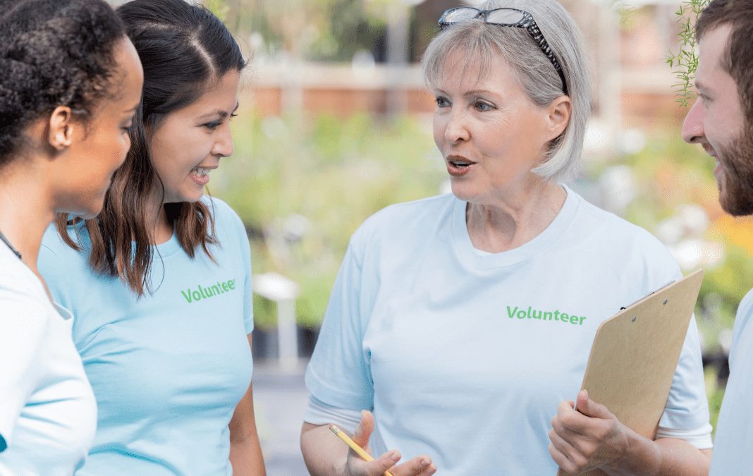 Staff ensuring a volunteered is trained.